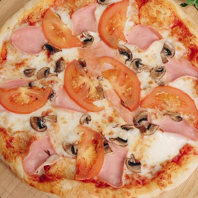 С ветчиной и грибамив Chudu Pizza по цене 1179 ₽