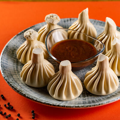 Хинкали с говядиной и свининой в Аджарули по цене 110 ₽