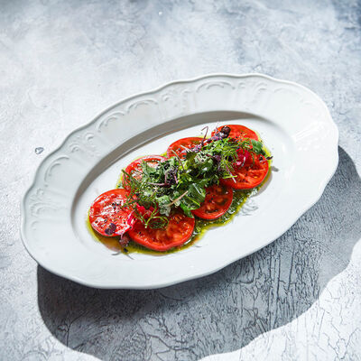 Карпаччо из узбекских томатов с козьим сыром в Гастродача Вселуг по цене 800 ₽