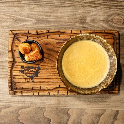 Суп Сырный с гренками в Гриль Бар Понеслось по цене 560 ₽