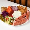 Хот-дог на тарелке в Shako Kebab по цене 419