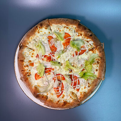 Пицца Цезарь в Парнас по цене 700 ₽