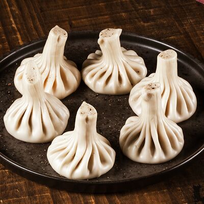 Хинкали с минтаем и шпинатом в TATEV по цене 160 ₽