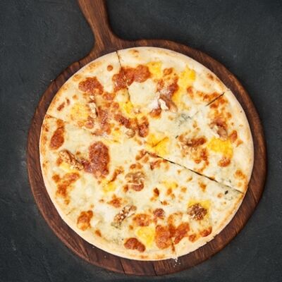 Пицца «Четыре сыра» в Mojo по цене 620