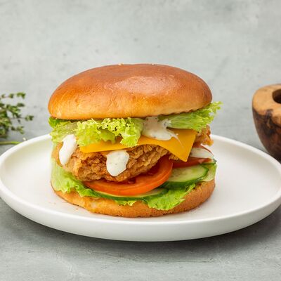 Бургер Криспи в Вкусный цыпленок по цене 560 ₽