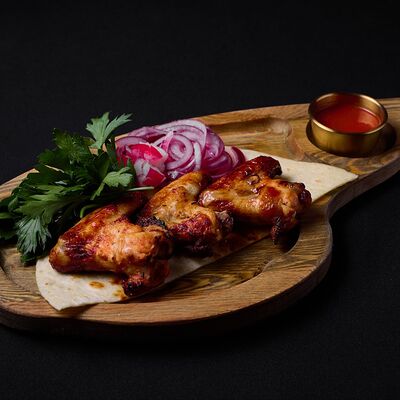 Куриные крылья на грилев Эндорфин по цене 790 ₽