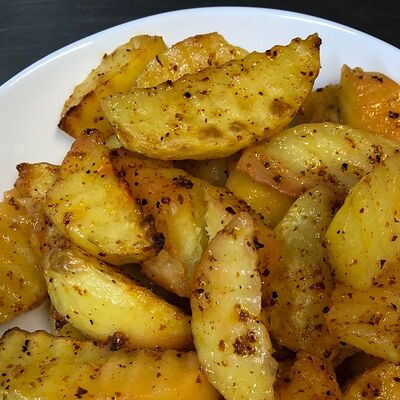 Картофель по-деревенски в Кафе Времена по цене 130 ₽