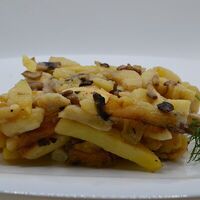 Картофель, жаренный с грибами в Масло
