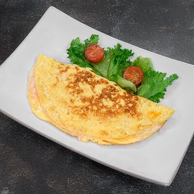 Омлет с ветчиной и сыром в Brauny по цене 290 ₽