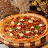 Пицца с чоризо и вялеными томатамив Hookah time