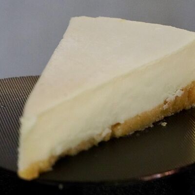 Классический чизкейк «Нью-Йорк» в Cosmo пицца пучча по цене 240 ₽