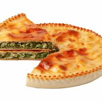 Осетинский пирог с курицей, шпинатом и сыром в Пекарня Чегем