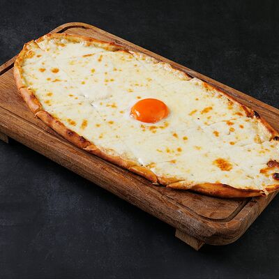 Пиде с сыром и яйцом в Alibaba Doner по цене 499 ₽