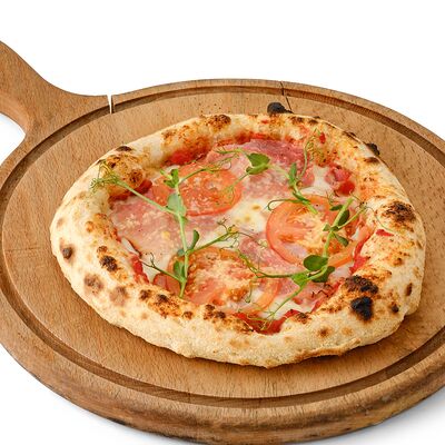 Пицца с окороком и томатами в Casa Mia по цене 390 ₽