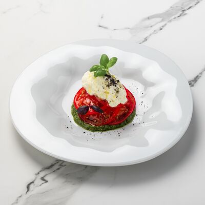 Сыр страчателла с томатами и соусом песто в Bruni Prosecco Bar по цене 790 ₽