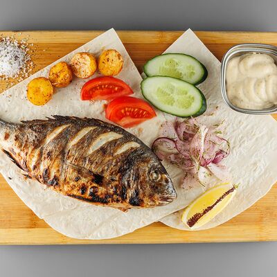 Дорадо на углях в Meat & Grill по цене 1240 ₽