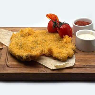 Шницель куриный в Кафе Жаровня по цене 650 ₽