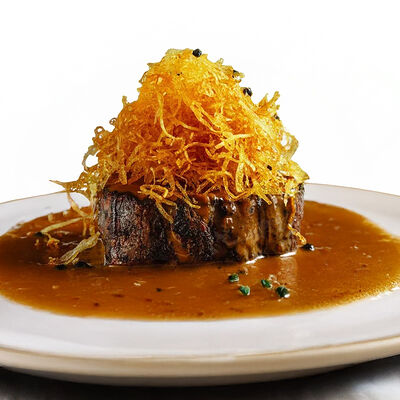 Филе миньон с соусом брендив Dodici Grill по цене 2530 ₽