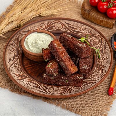 Гренки чесночные в Русская кухня по цене 310 ₽