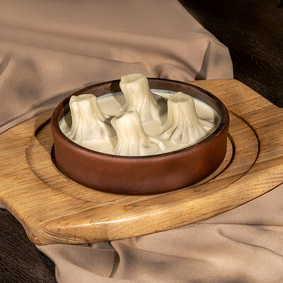 Хинкали патара в соусе чкмерули в Аджикинежаль по цене 530 ₽