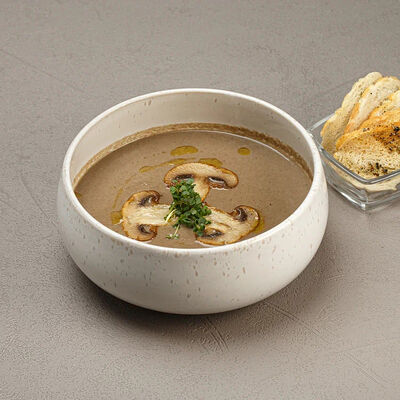 Крем-суп из лесных грибов с гренками в Диккенс по цене 450 ₽