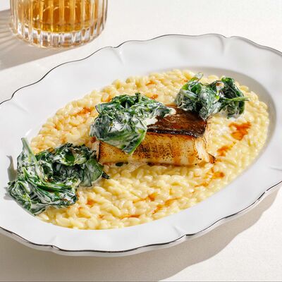 Палтус с орзо и молодым шпинатом в сливках в Cristal по цене 1400 ₽