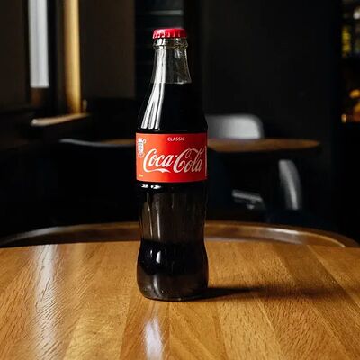 Coca-Cola 0,33 в Lucky Duck по цене 450 ₽