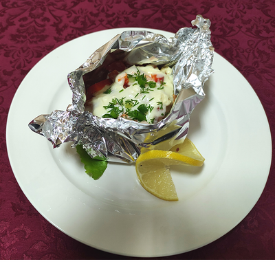 Лосось (кета), запеченный с овощами в фольге в Любимая по цене 370 ₽