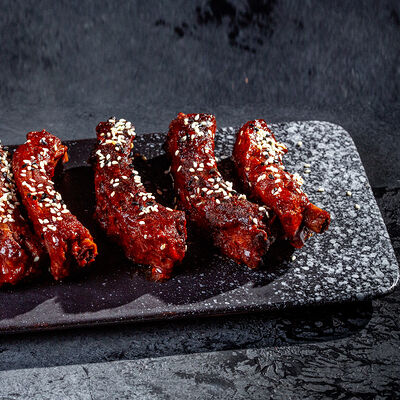 Свиные ребра в соусе BBQ в Tre/Quarti по цене 840 ₽