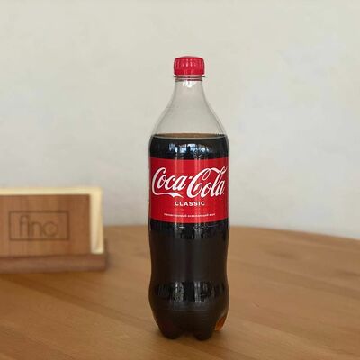 Coca-Cola в Fino по цене 250 ₽