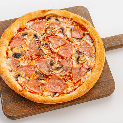 Пицца с ветчиной и грибами на тонком тесте в Morricone pizza & wine по цене 680 ₽