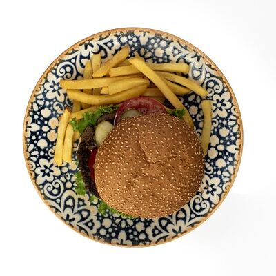 Говяжий бургер с картофелем фри в MAHALLA по цене 3800 ₸