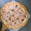 Пицца с ветчиной и грибами в На югах по цене 830