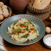 Вареники с картофелем и беконом и жареным луком в Дэда