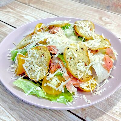 Цезарь со слабосолёной горбушей в ПиЦЦунда Море начинки по цене 570 ₽