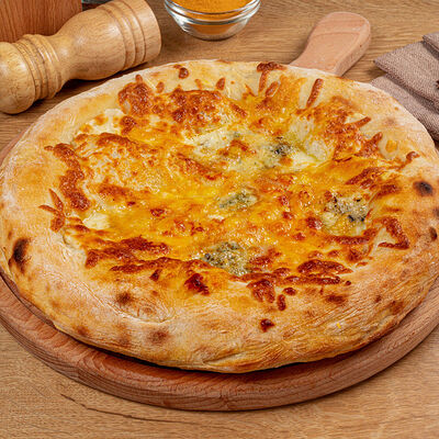 Пицца Н Четыре сыра в TeaRoom по цене 759 ₽