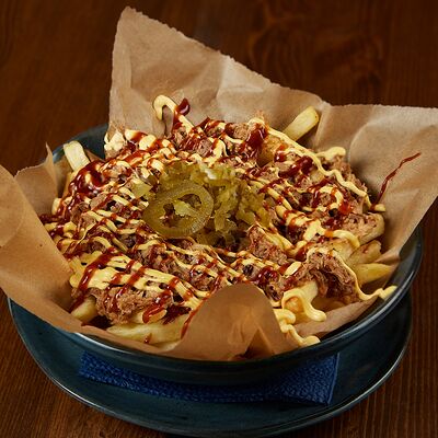 Картофель с рваной свининой в Bullet Bar по цене 640 ₽