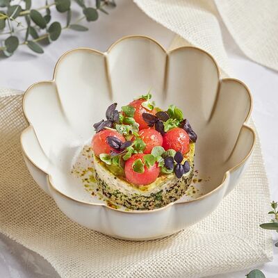 Печеные баклажаны с кускусом, киноа и томатами в Ribambelle по цене 750 ₽