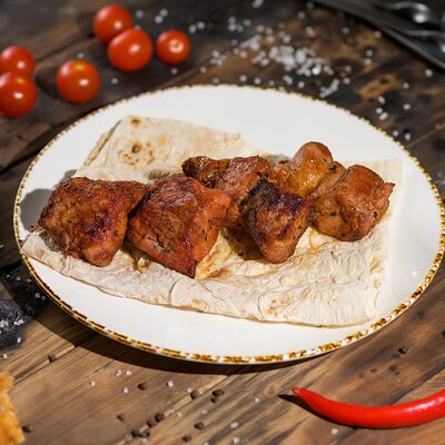 Шашлык из свиной шейки 200г в Ресторан Мангал по цене 400 ₽