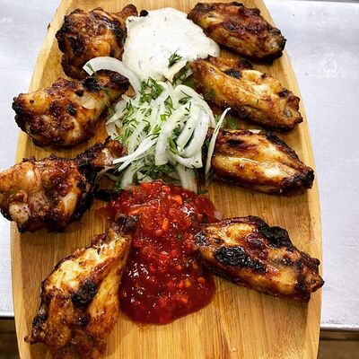 Куриные крылышки барбекю L в The Кухня по цене 600 ₽