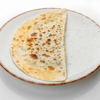 Кутаб с сыром и зеленью в Хинкальная Кацо по цене 155 ₽