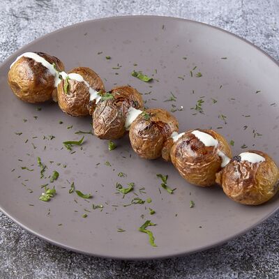 Молодой картофель на мангале в Тим Шашлык & Бургер по цене 280 ₽