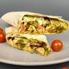 Шаурма итальянская с курицей в Мужчина готовит по цене 400