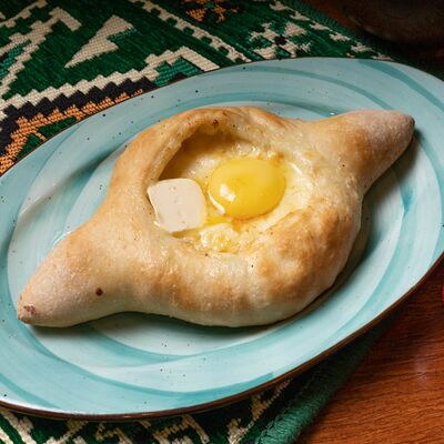 Хачапури по-аджарски в Пхали по цене 620 ₽