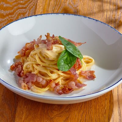 Спагетти Карбонара в Munhell по цене 830 ₽