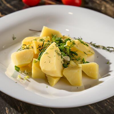 Картофель по-деревенски в Oзеро гриль по цене 230 ₽