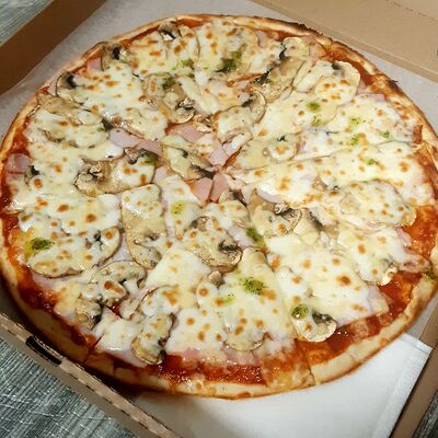 Ветчина и грибы в Вкусно Пицца по цене 890 ₽