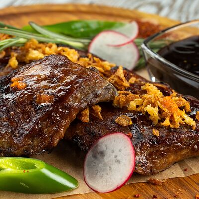 Свиные ребра к пиву в William Bass по цене 1100 ₽