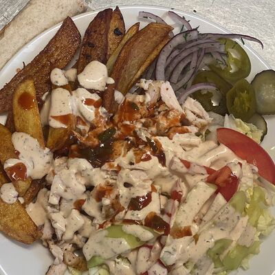 Шаурма куриная в тарелке в Мзиури по цене 360 ₽