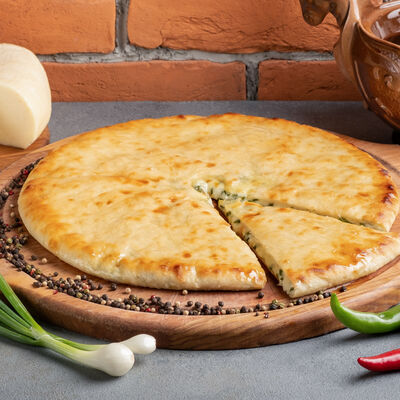 Осетинский пирог с сыром и луком в Жар-Птица по цене 390 ₽